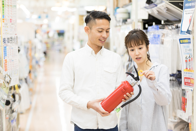 消化器を購入する人